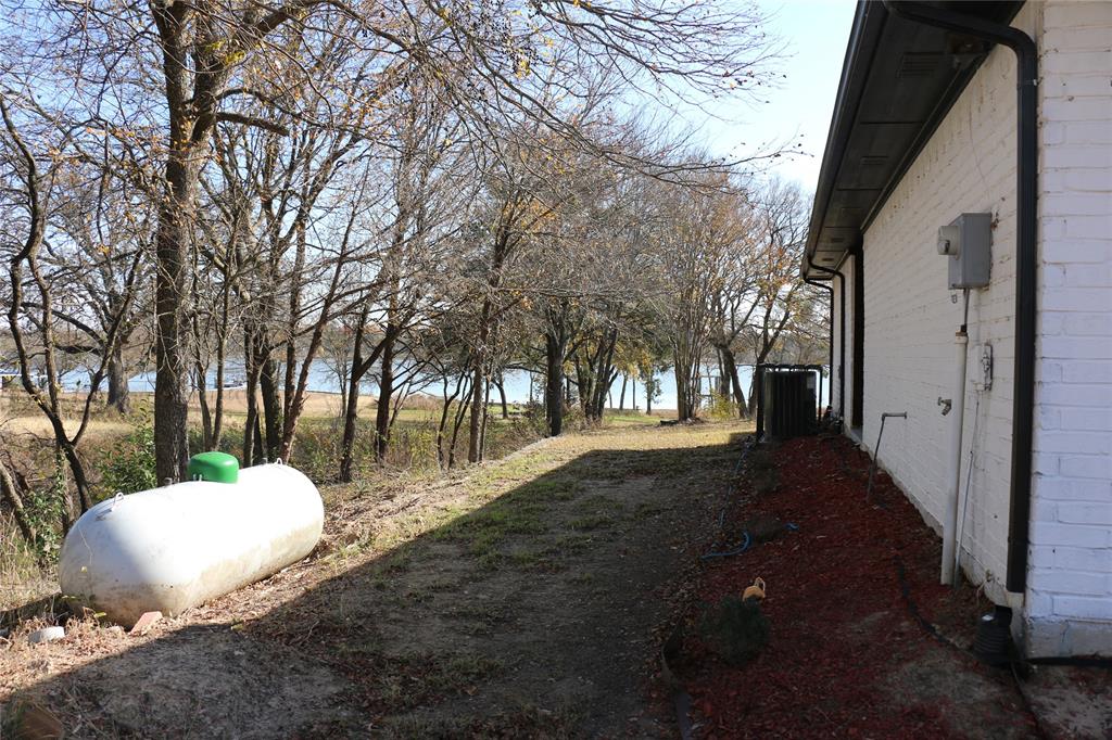 2858 Waters Edge Quinlan, TX 75474 - Photo 29 of 34 a view of outdoor space and yard