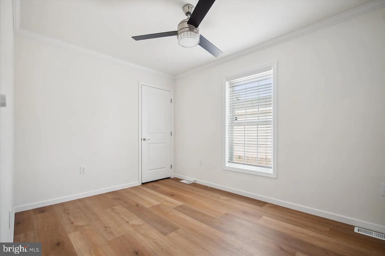 10 Ginger Lane Conowingo, MD 21918 - Photo 22 of 34 an empty room with windows and fan