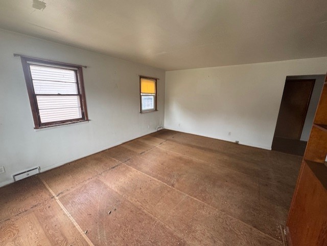 215 North Ohio Street Aurora, IL 60505 - Photo 4 of 8 an empty room with windows
