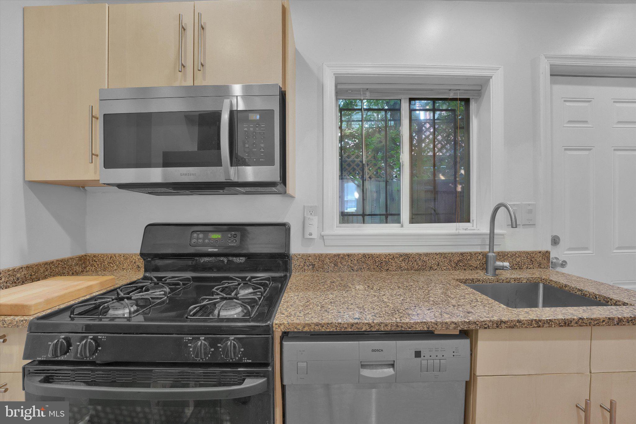 890 North Stillman Street Philadelphia, PA 19130 - Photo 8 of 28 Modern kitchen with sleek appliances.
