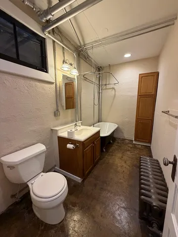 a bathroom with a sink and shower