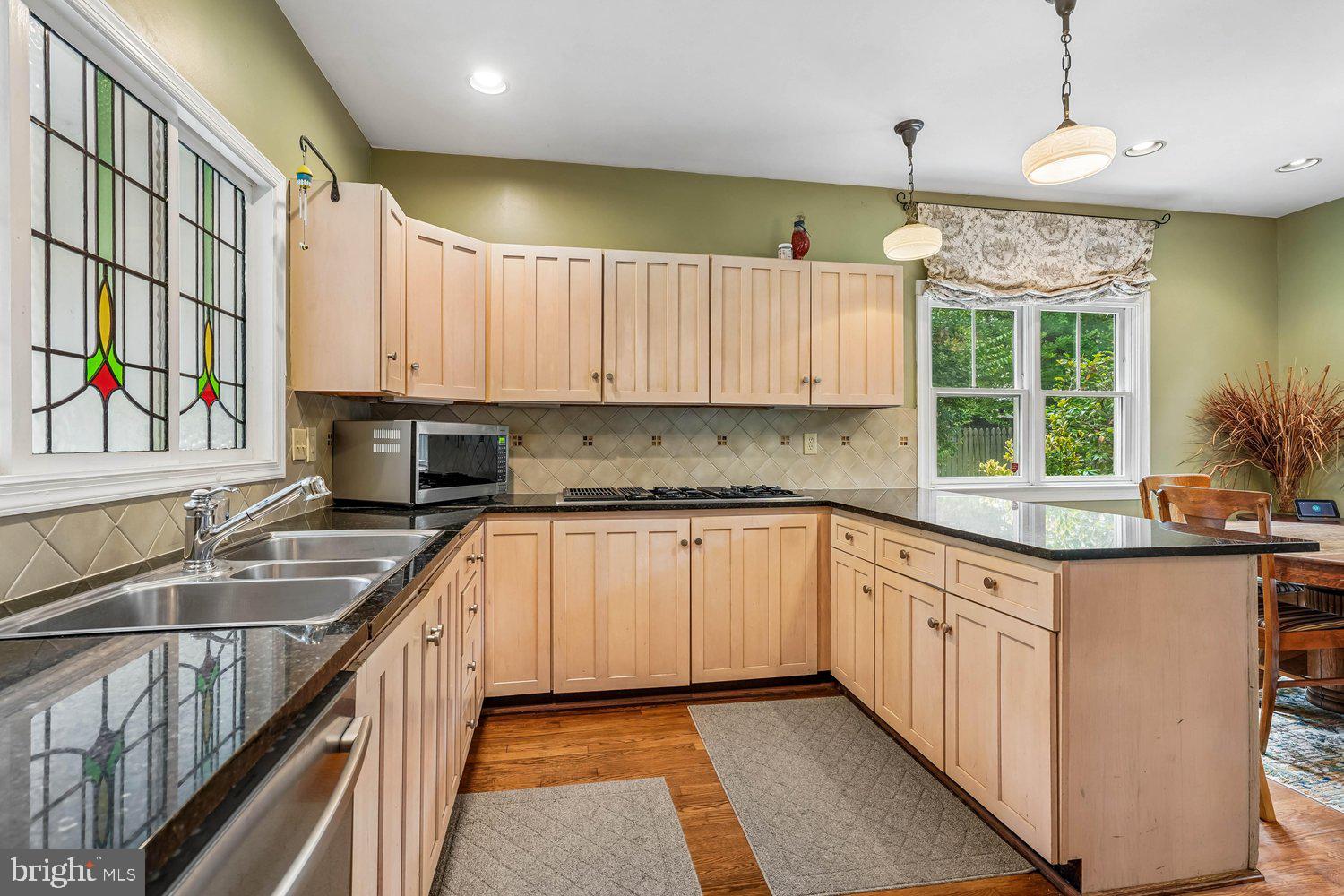 16 Maple Avenue Washington Grove, MD 20880 - Photo 22 of 58 Charming kitchen with stained glass accents.