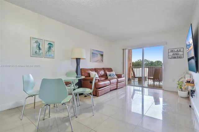 a bathroom with a shower and a toilet