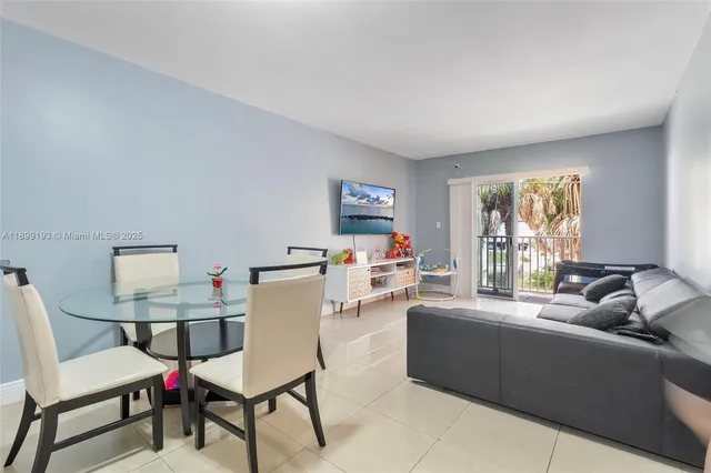 a bathroom with a sink a toilet and a shower