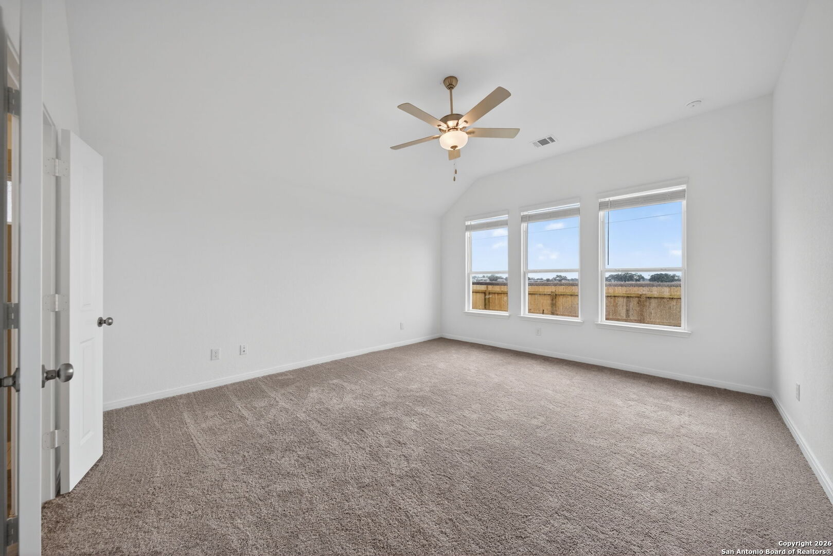 5755 Musquiz Ridge Seguin, TX 78155 - Photo 17 of 31 a view of an empty room with a window