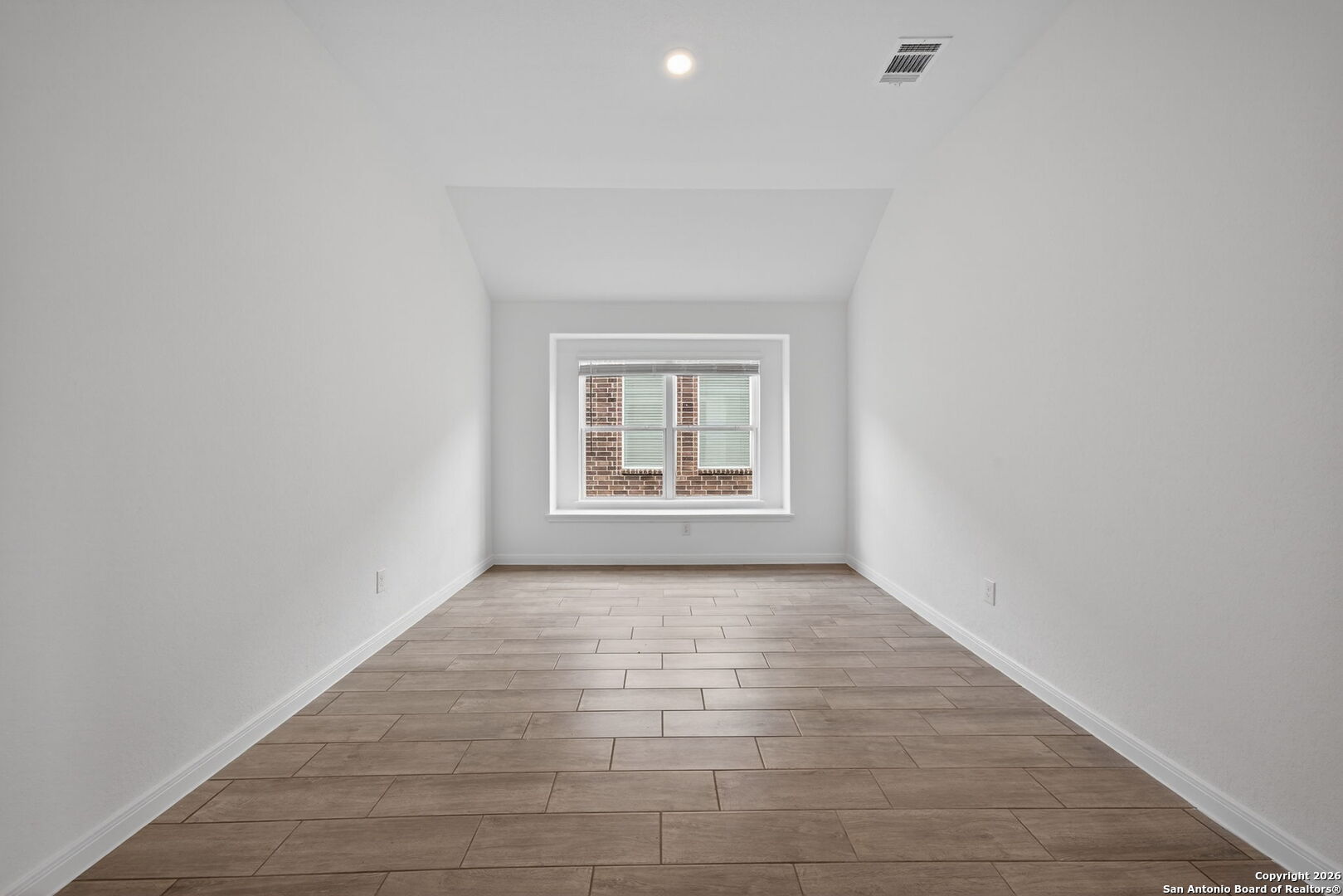 5755 Musquiz Ridge Seguin, TX 78155 - Photo 5 of 31 an empty room with windows