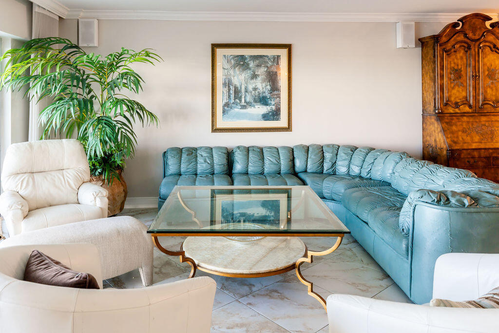 875 East Camino Real Boca Raton, FL 33432 - Photo 12 of 31 a living room with furniture and a couch