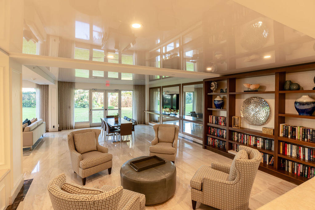 875 East Camino Real Boca Raton, FL 33432 - Photo 26 of 31 a living room with furniture and a large window