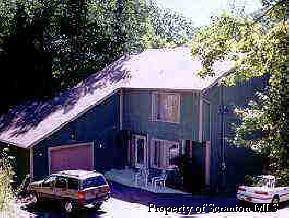 a car parked in front of a house