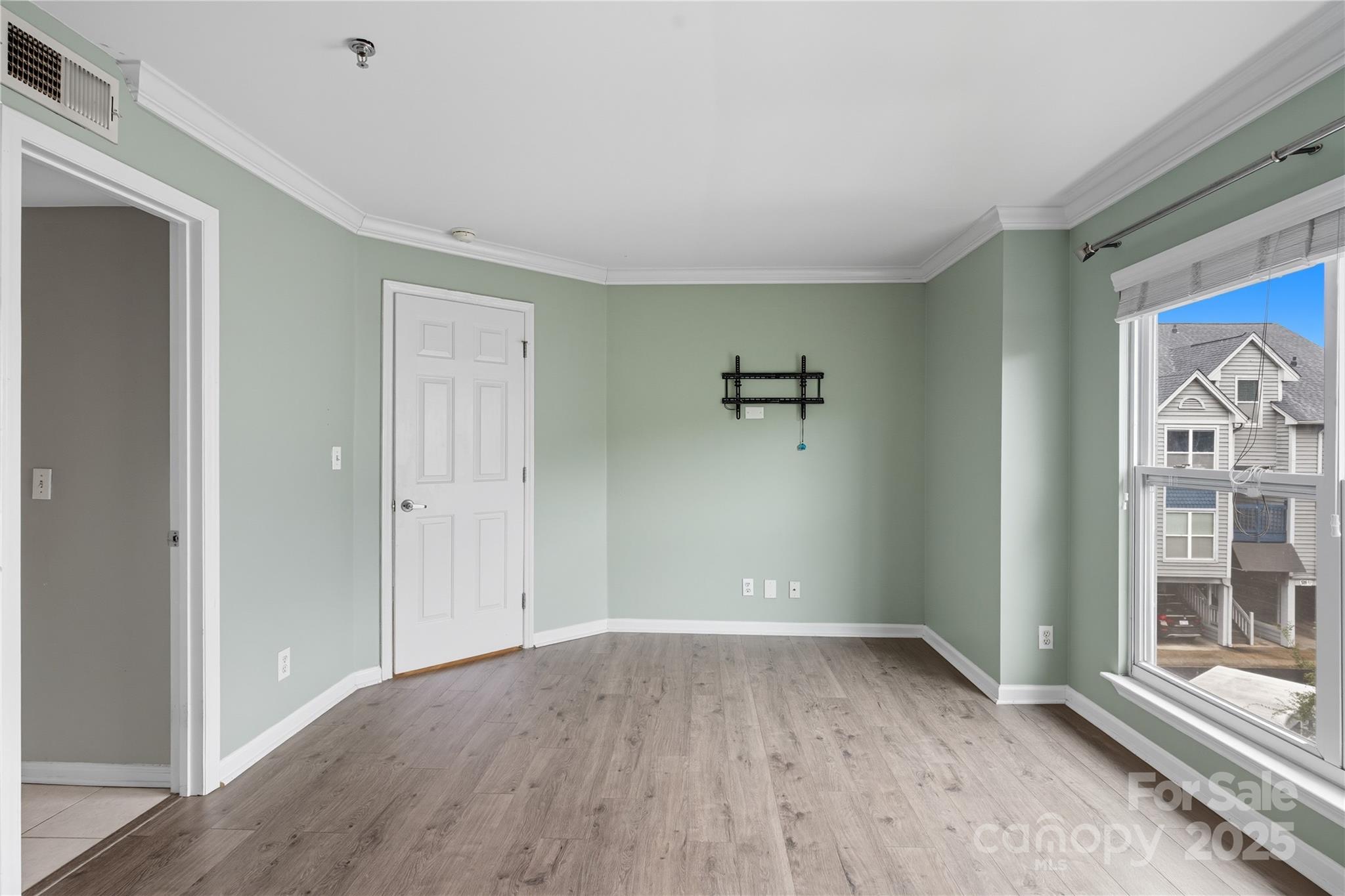 509 North Graham Street, Unit 3J Charlotte, NC 28202 - Photo 17 of 32 a view of room with window