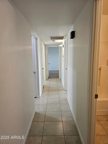 a kitchen with stainless steel appliances a refrigerator and a stove