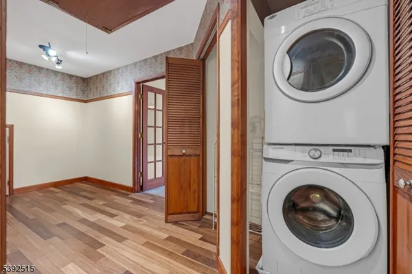 a bathroom with a sink mirror vanity and toilet