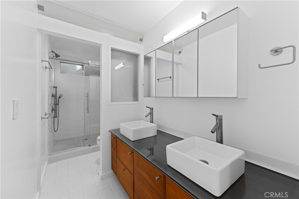 14960 Victory Boulevard, Unit 102 Van Nuys, CA 91411 - Photo 14 of 26 Primary bathroom