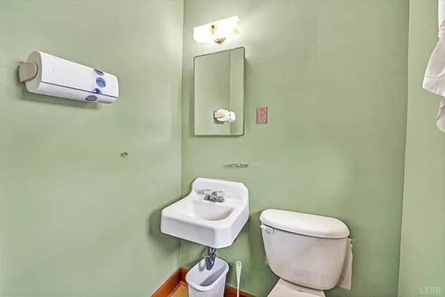 a bathroom with a toilet and sink
