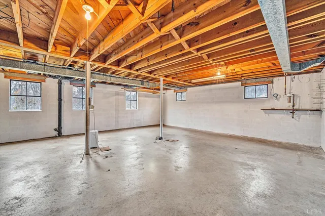 a view of empty room with windows