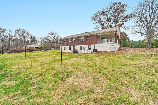 a view of a house with swimming pool