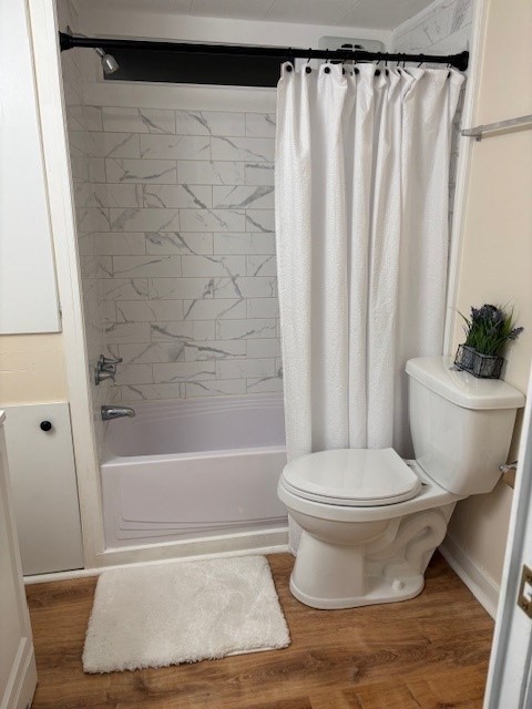 229 Miller Street, Unit B2 Ludlow, MA 01056 - Photo 14 of 22 a white toilet sitting next to a bathtub