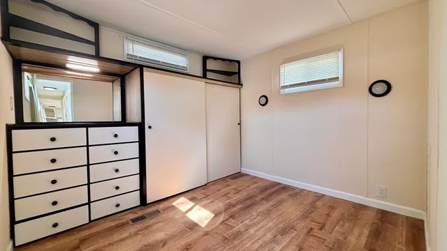 a view of a hallway with closet