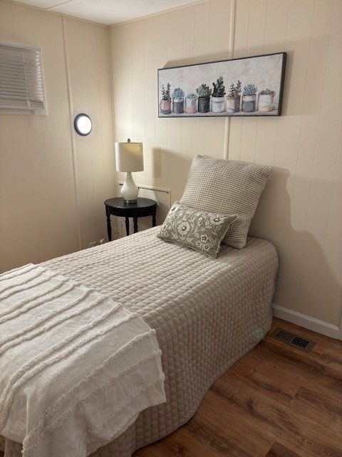 229 Miller Street, Unit B2 Ludlow, MA 01056 - Photo 10 of 22 a bedroom with a bed and painting on the wall