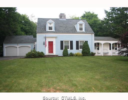 42 Pool Road North Haven, CT 06473 - Photo 1 of 1 a front view of a house with a garden