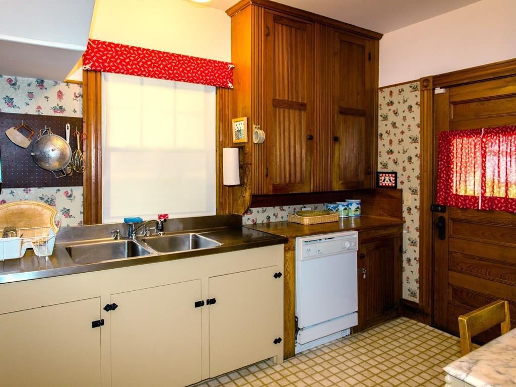 26 Manchester Road Northeast Harbor, ME 04662 - Photo 17 of 35 Kitchen with side entry door.