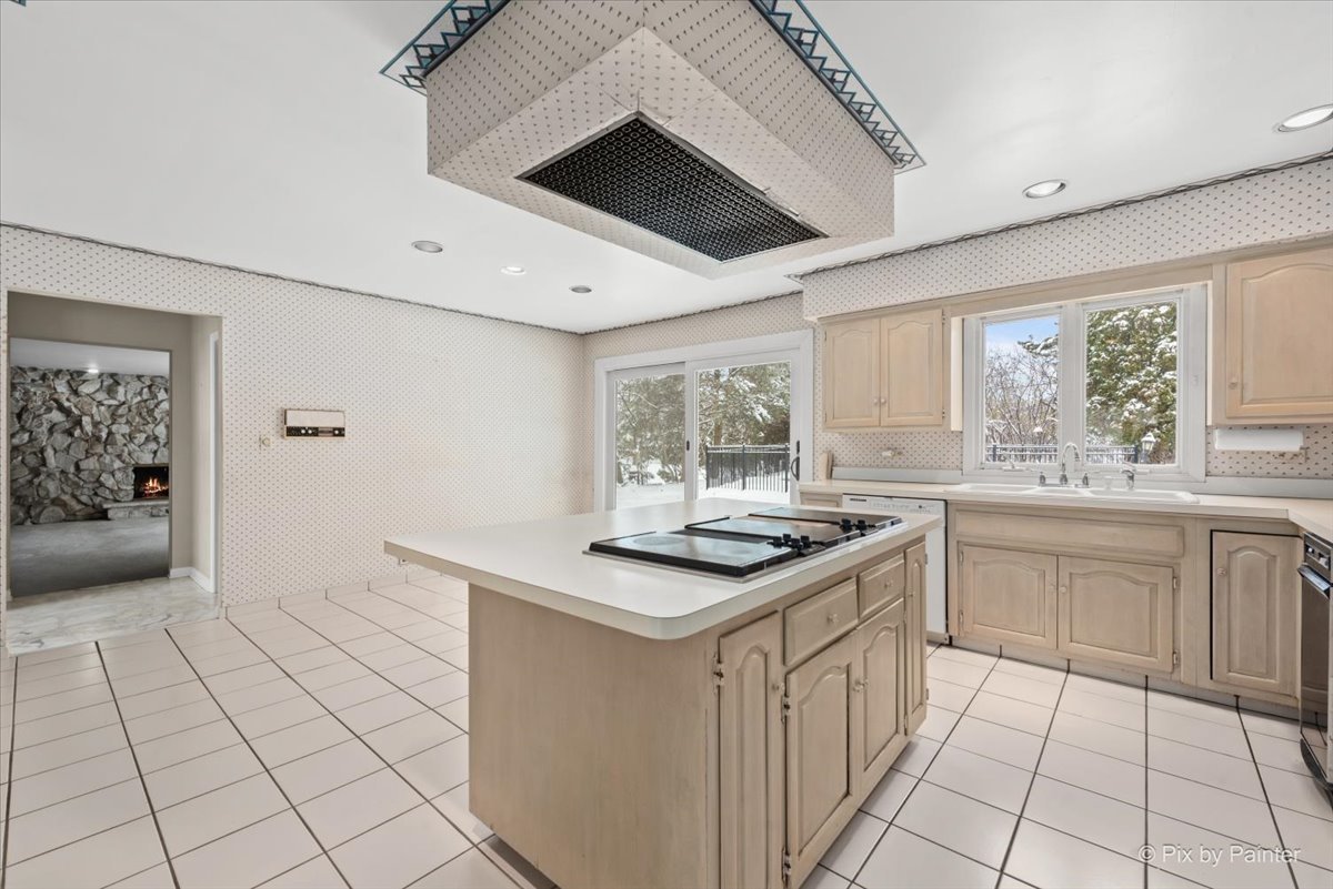 274 Timber View Drive Oak Brook, IL 60523 - Photo 13 of 68 a kitchen with a sink stove and cabinets