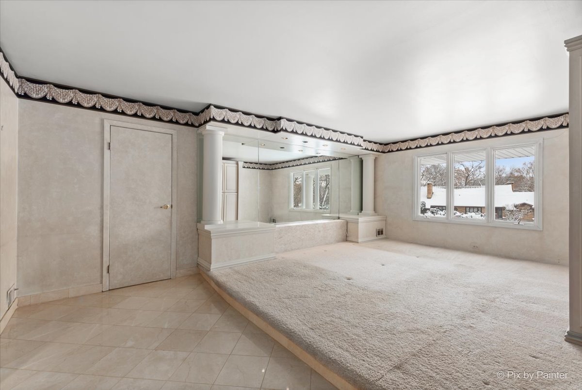 274 Timber View Drive Oak Brook, IL 60523 - Photo 24 of 68 a large white bed in a white room