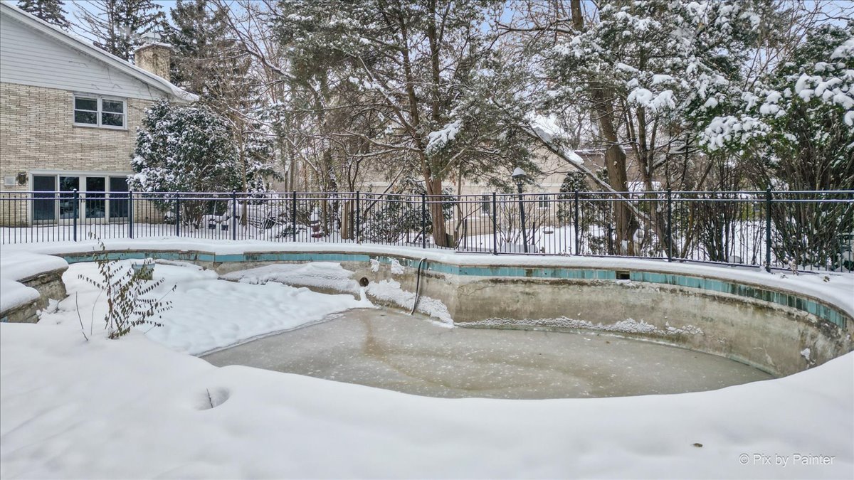274 Timber View Drive Oak Brook, IL 60523 - Photo 48 of 68 a view of a swimming pool with a patio
