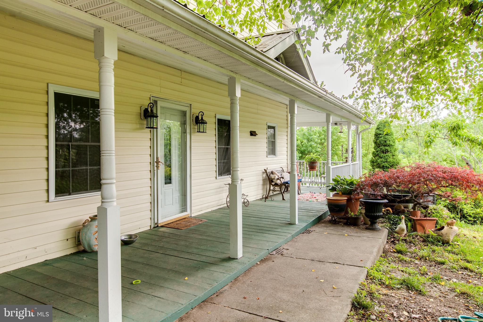 4292 River Road Berkeley Springs, WV 25411 - Photo 3 of 39 Covered Wrap Around Front Porch Pic 1