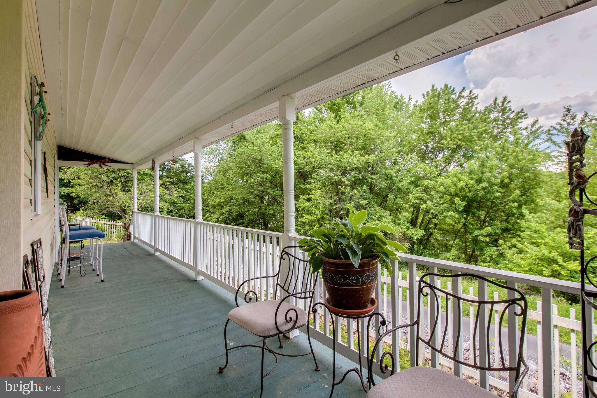 4292 River Road Berkeley Springs, WV 25411 - Photo 4 of 39 Covered Wrap Around Front Porch Pic 2