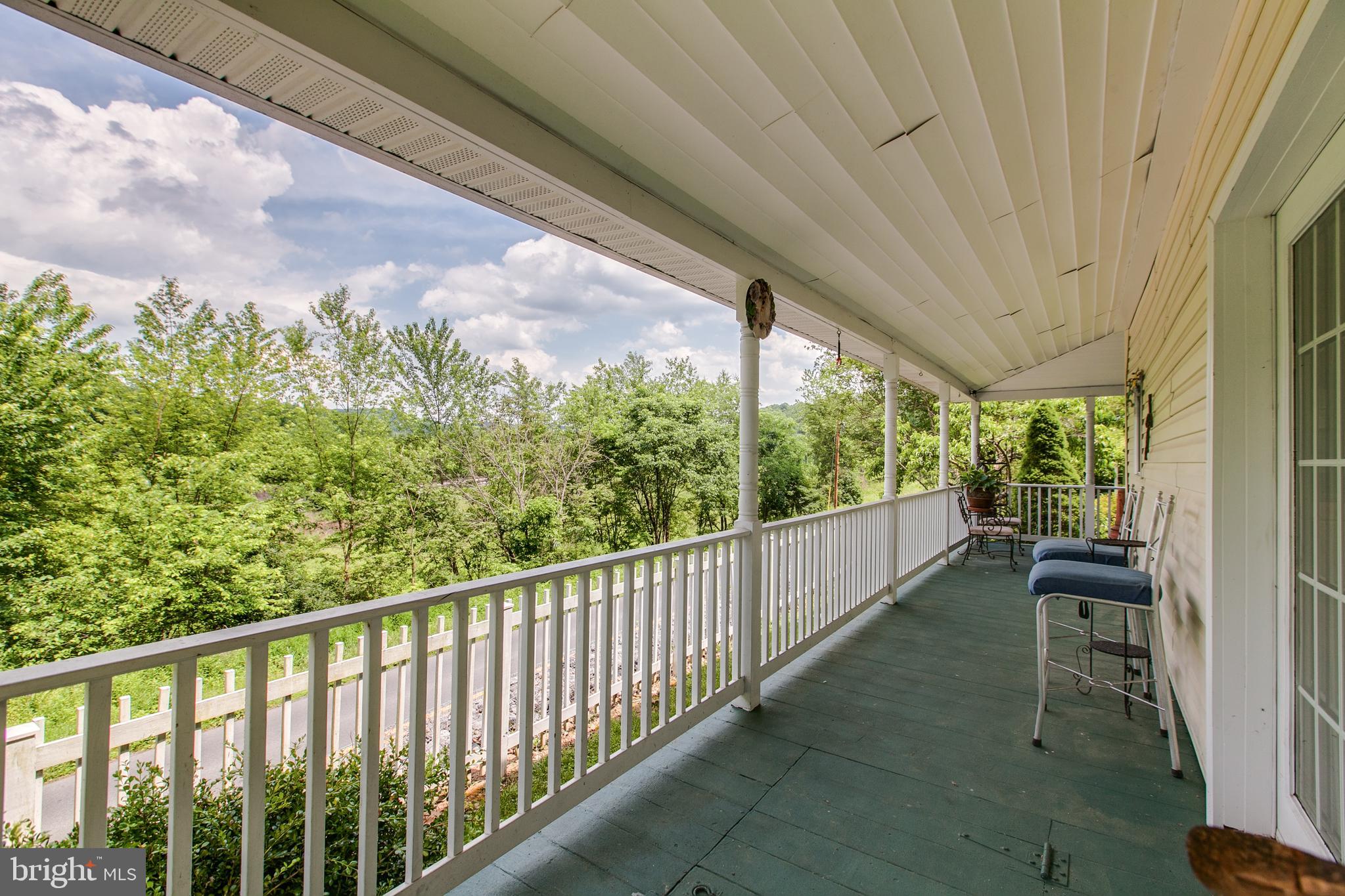 4292 River Road Berkeley Springs, WV 25411 - Photo 32 of 39 Covered Wrap Around Front Porch Pic 4