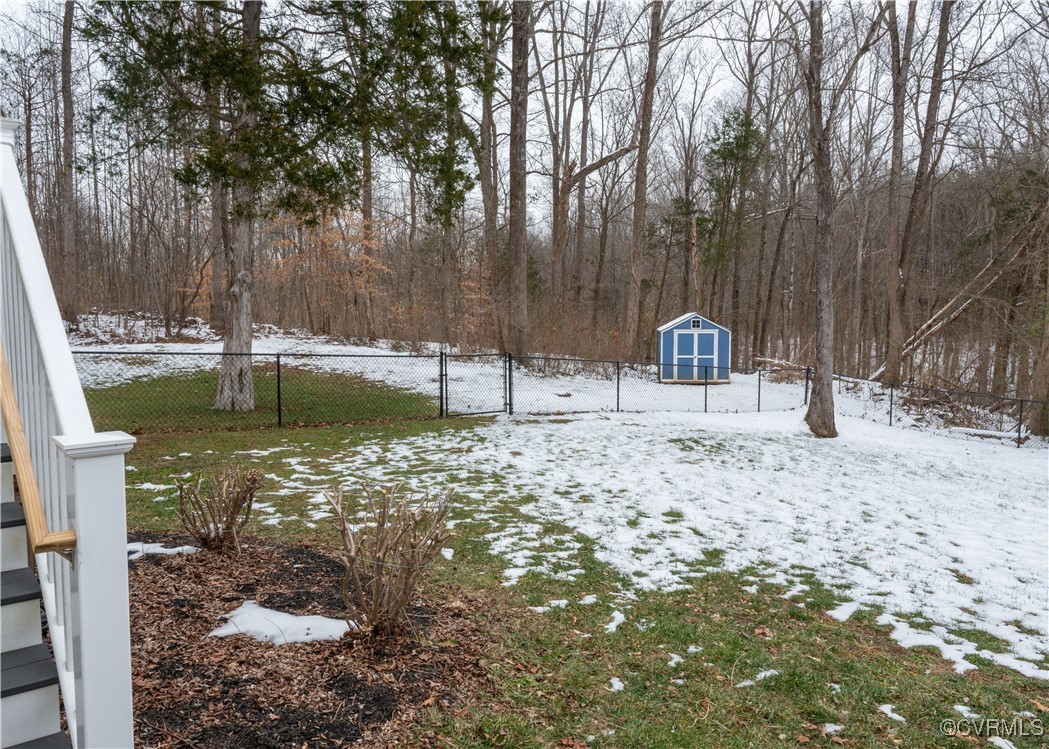 2750 Trenholm Road Powhatan, VA 23139 - Photo 31 of 42 Yard covered in snow featuring a storage unit