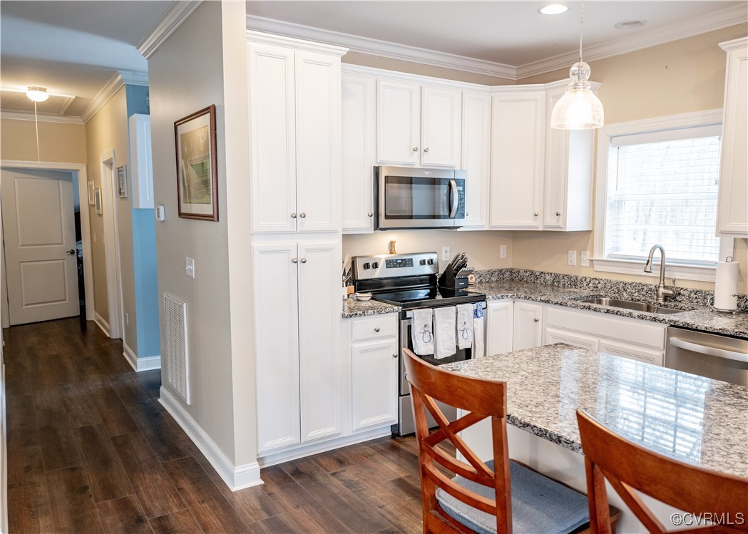 2750 Trenholm Road Powhatan, VA 23139 - Photo 6 of 42 Kitchen featuring granite counters, white cabinets