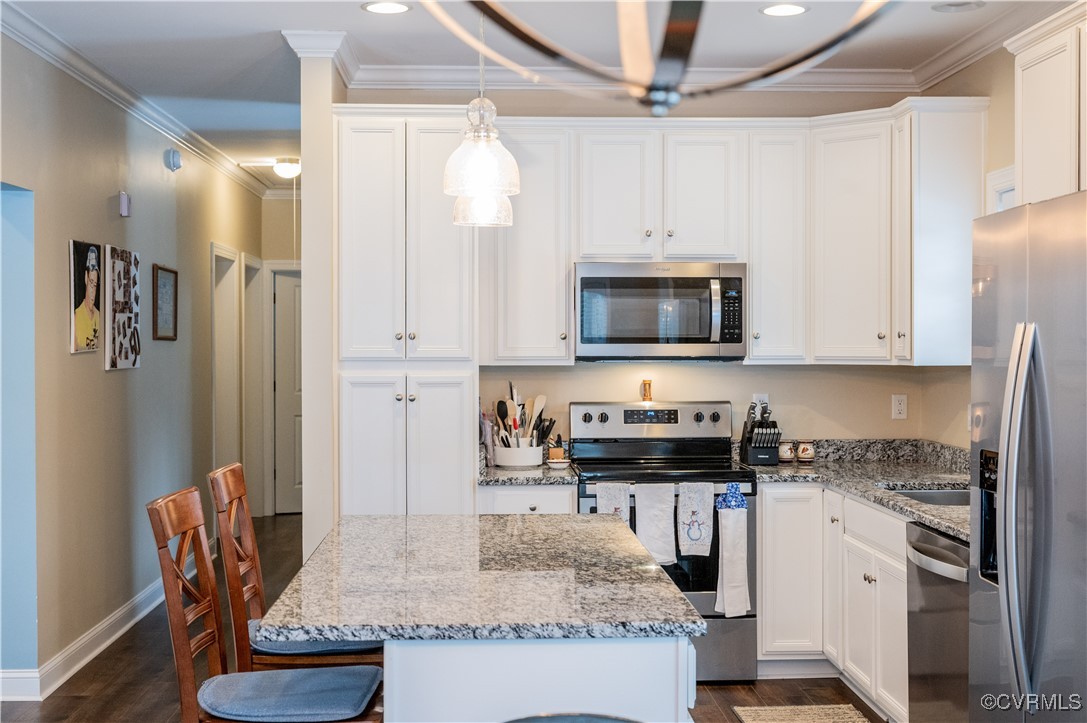 2750 Trenholm Road Powhatan, VA 23139 - Photo 8 of 42 Kitchen with white cabinetry, hanging light fixtur