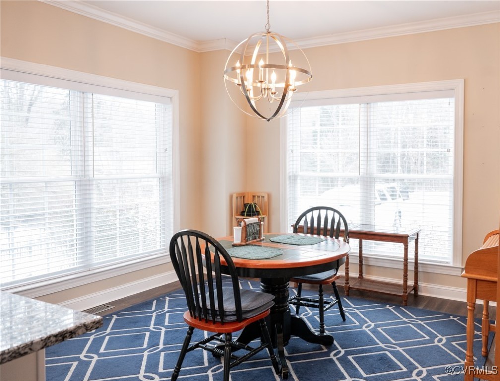 2750 Trenholm Road Powhatan, VA 23139 - Photo 10 of 42 Dining room with a notable chandelier, crown moldi