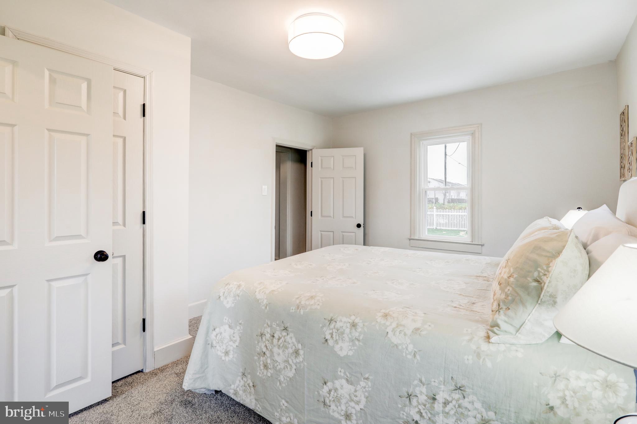 1965 Greenbriar Road York, PA 17404 - Photo 14 of 37 a bedroom with a bed and a window