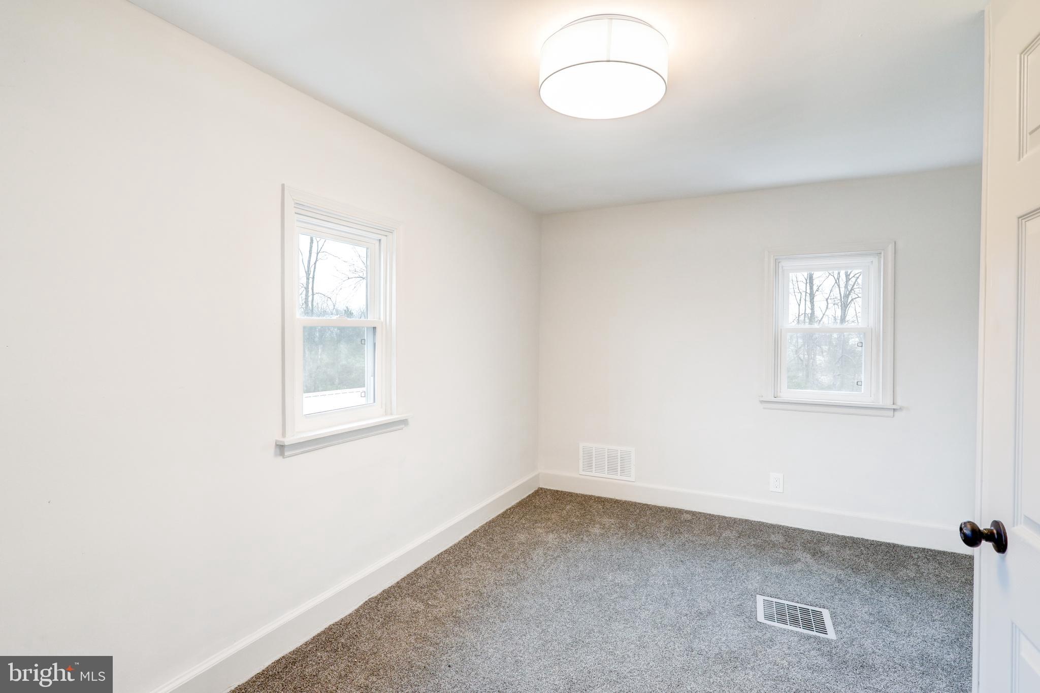1965 Greenbriar Road York, PA 17404 - Photo 19 of 37 an empty room with windows