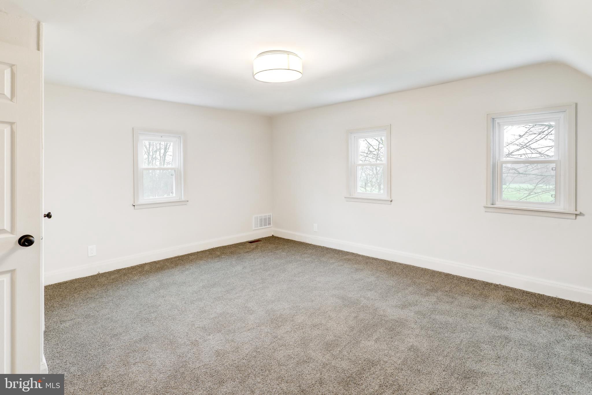 1965 Greenbriar Road York, PA 17404 - Photo 23 of 37 an empty room with windows