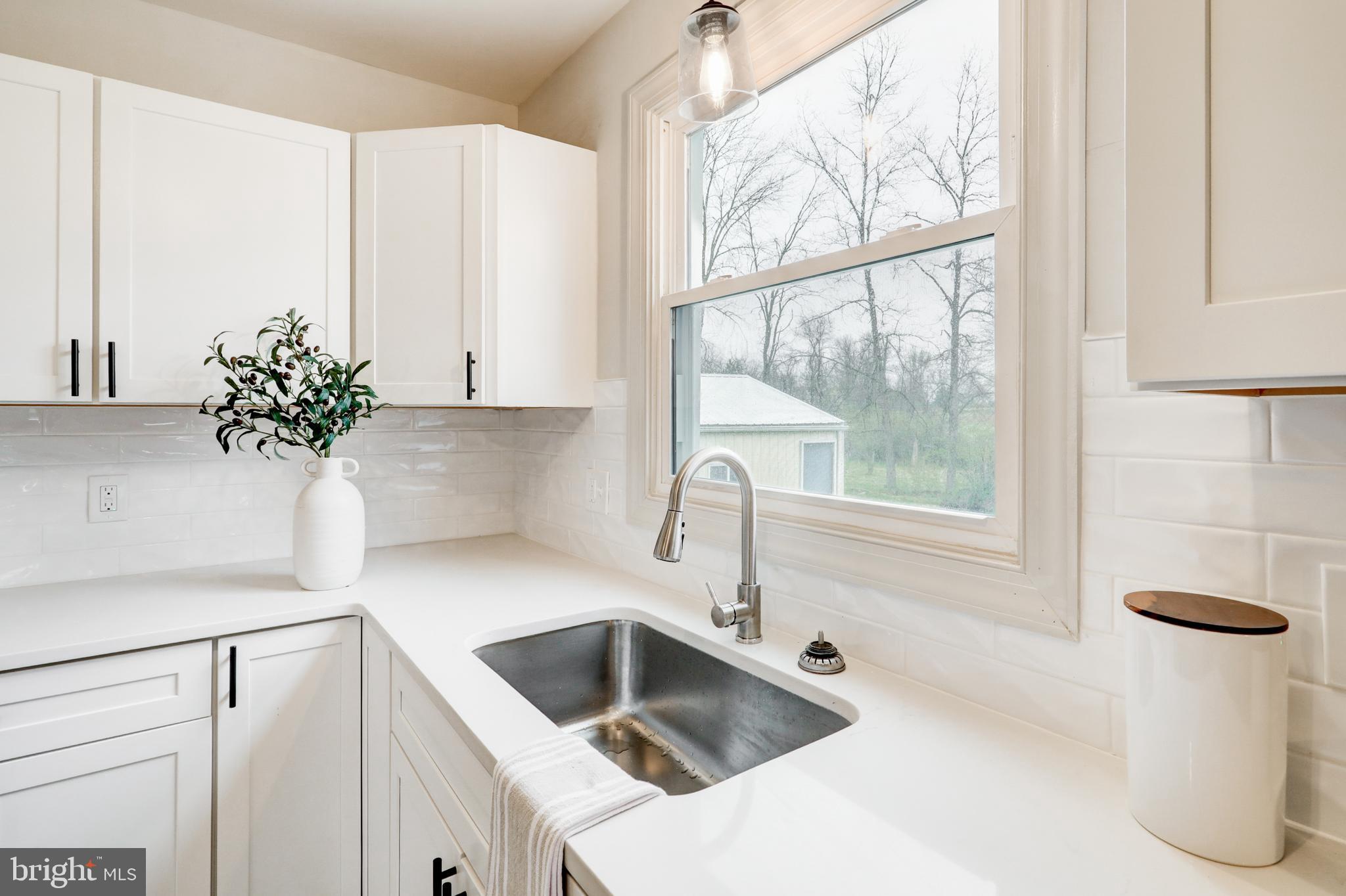 1965 Greenbriar Road York, PA 17404 - Photo 8 of 37 a kitchen with a sink and a refrigerator