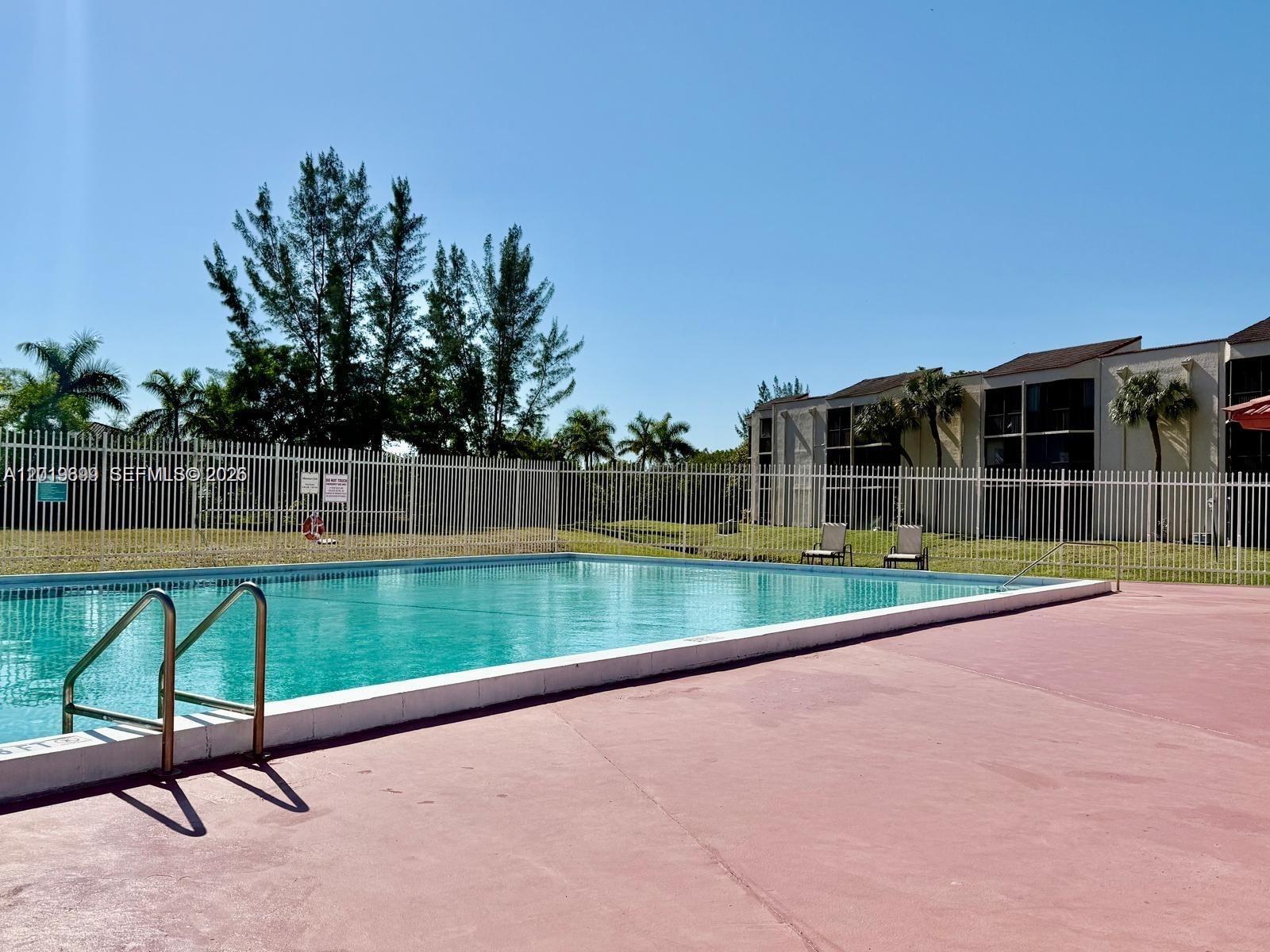 3470 Foxcroft Road, Unit 204 Miramar, FL 33025 - Photo 39 of 40 a view of a tennis court