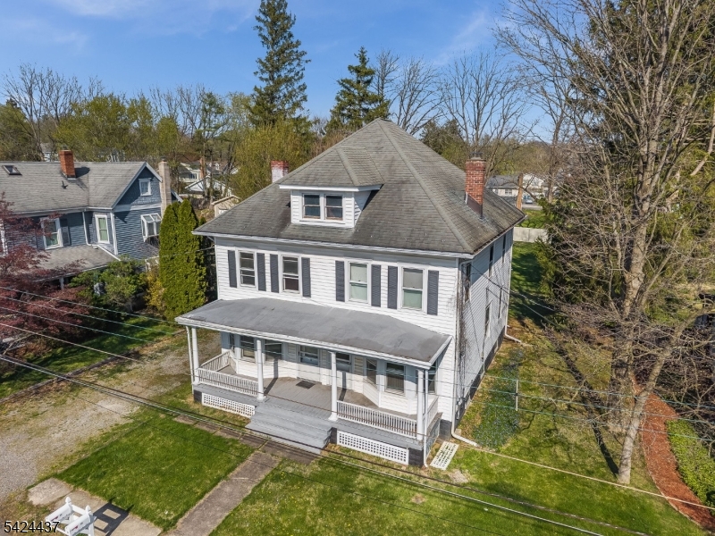 18 Center Street Annandale, NJ 08801 - Photo 8 of 26 a aerial view of a house with a yard