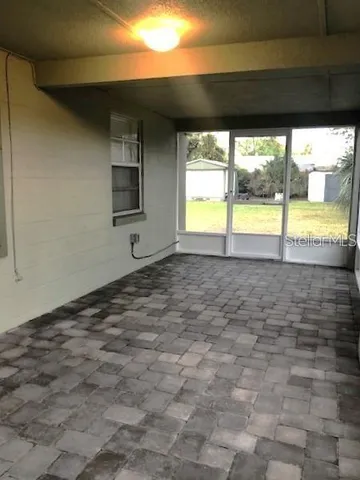 a view of an empty room and window