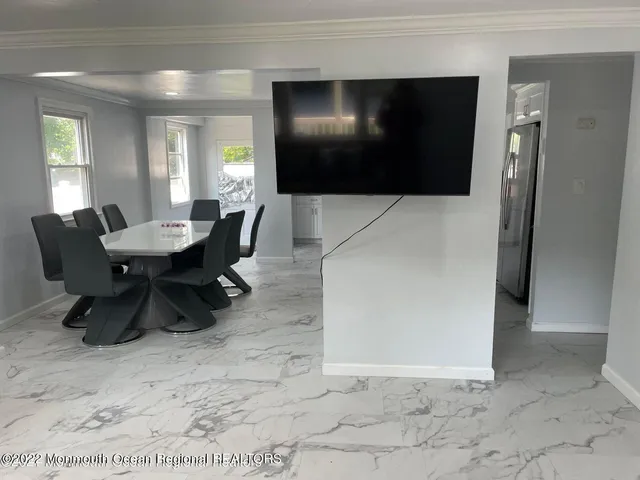 a view of a dining room with furniture