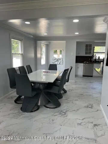 a workspace with furniture and window