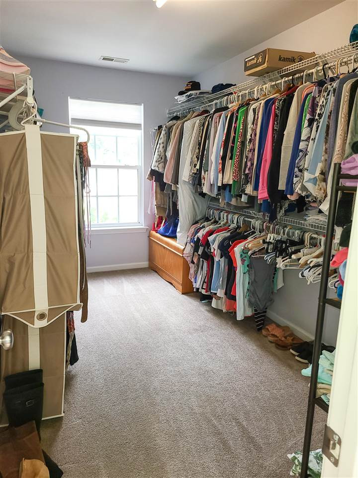 3234 Enchanting Way Raleigh, NC 27616 - Photo 21 of 30 1 of 2 Primary Walk-in Closets, + Linen Closet! Huge Primary Walk-in Closet!