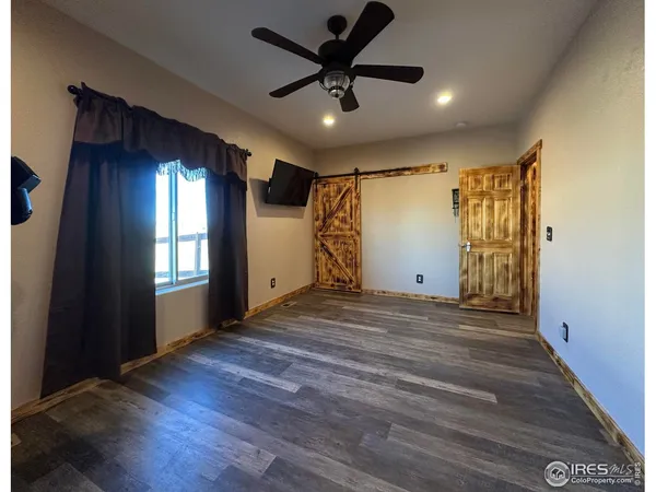 a view of storage and utility room with washer and dryer