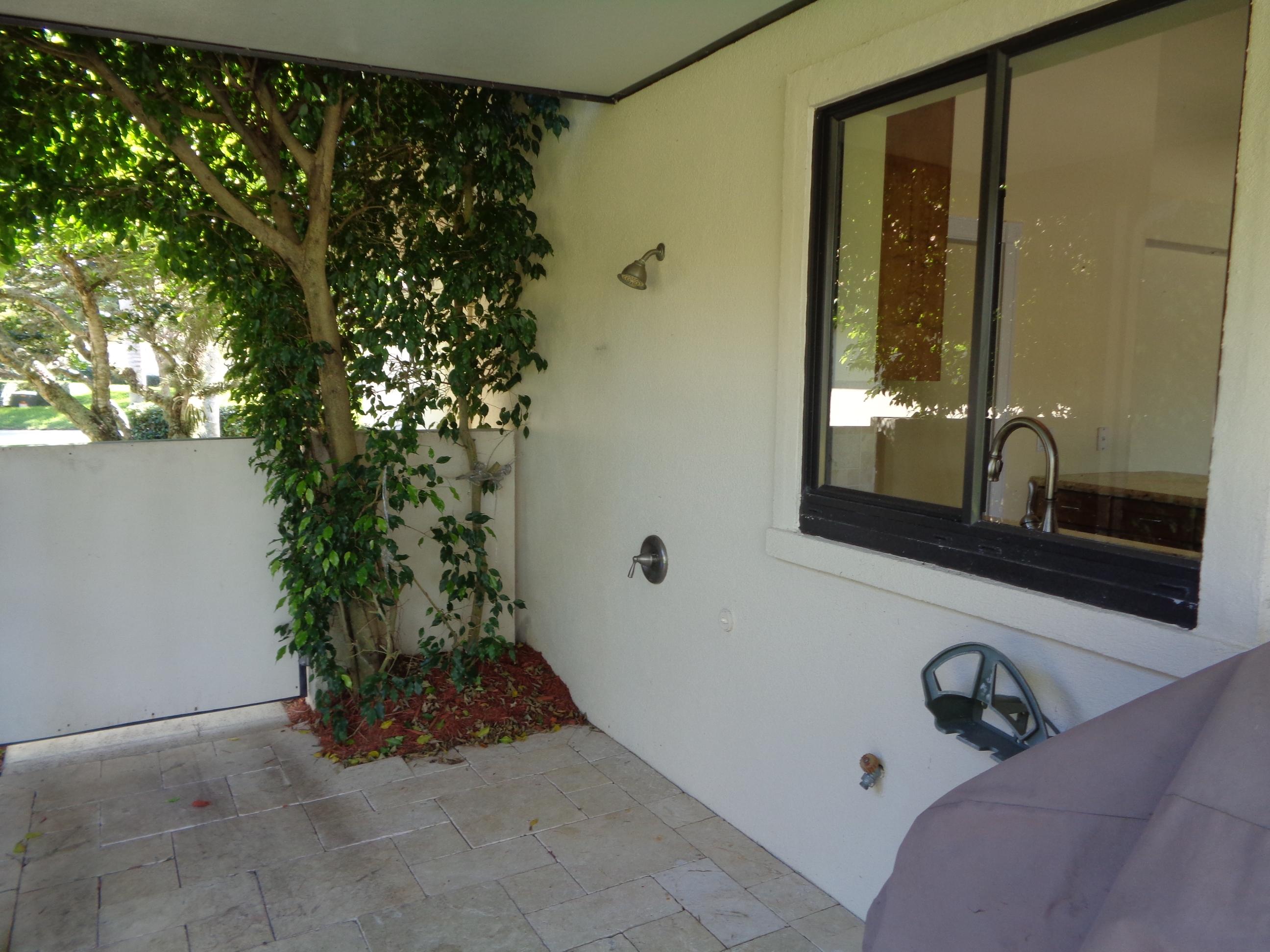 380 River Edge Road Jupiter, FL 33477 - Photo 22 of 38 Outdoor Shower