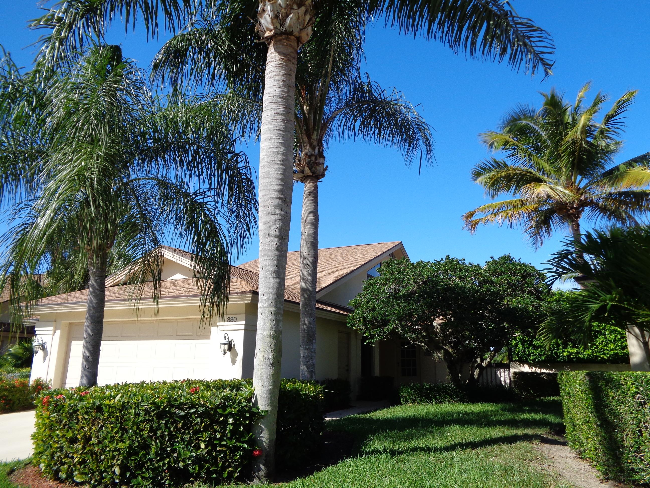 380 River Edge Road Jupiter, FL 33477 - Photo 3 of 38 Front/Side Exterior