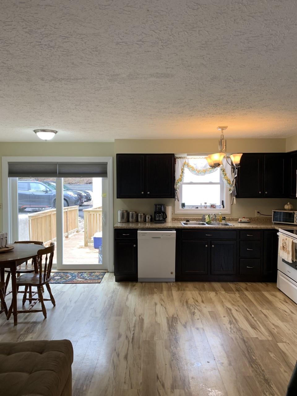 172 Pinewoods Road Canton, ME 04221 - Photo 2 of 22 0312 kitchen dishwasher patio doors spri