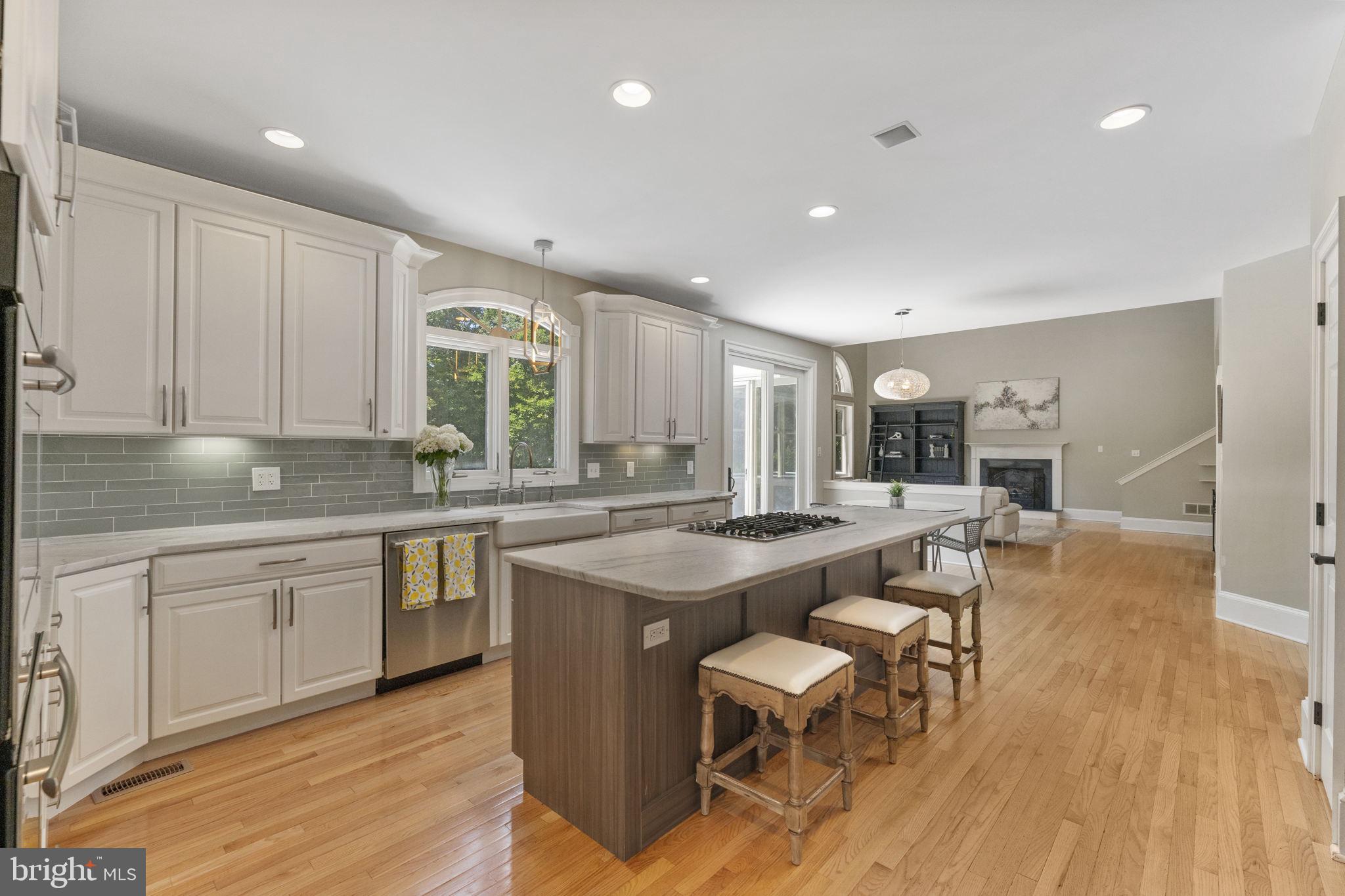 1122 King Of Prussia Road Wayne, PA 19087 - Photo 13 of 33 a kitchen with counter space sink stove and chairs